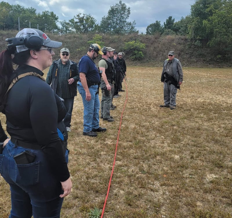students lined up behind the rope at Defensive Urban Rifle Class