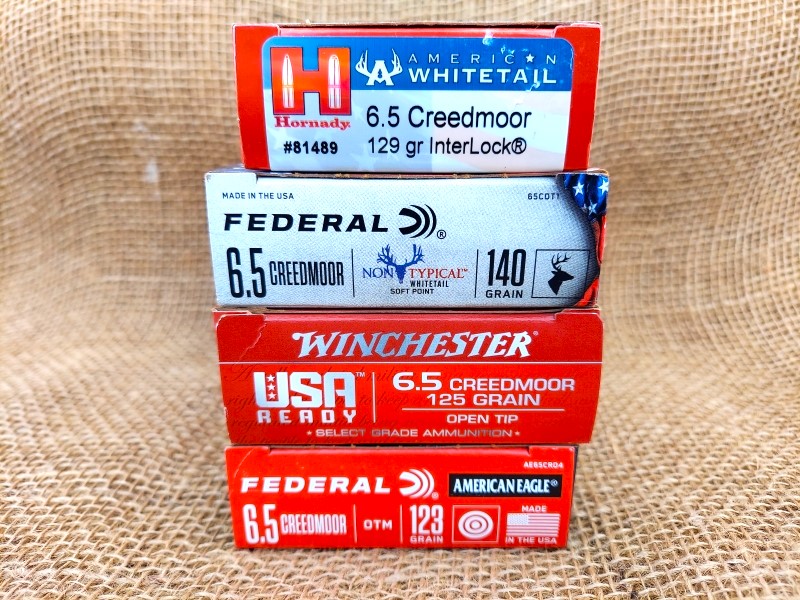 Boxes of 6.5 creedmoor ammo from various manufacturers. 