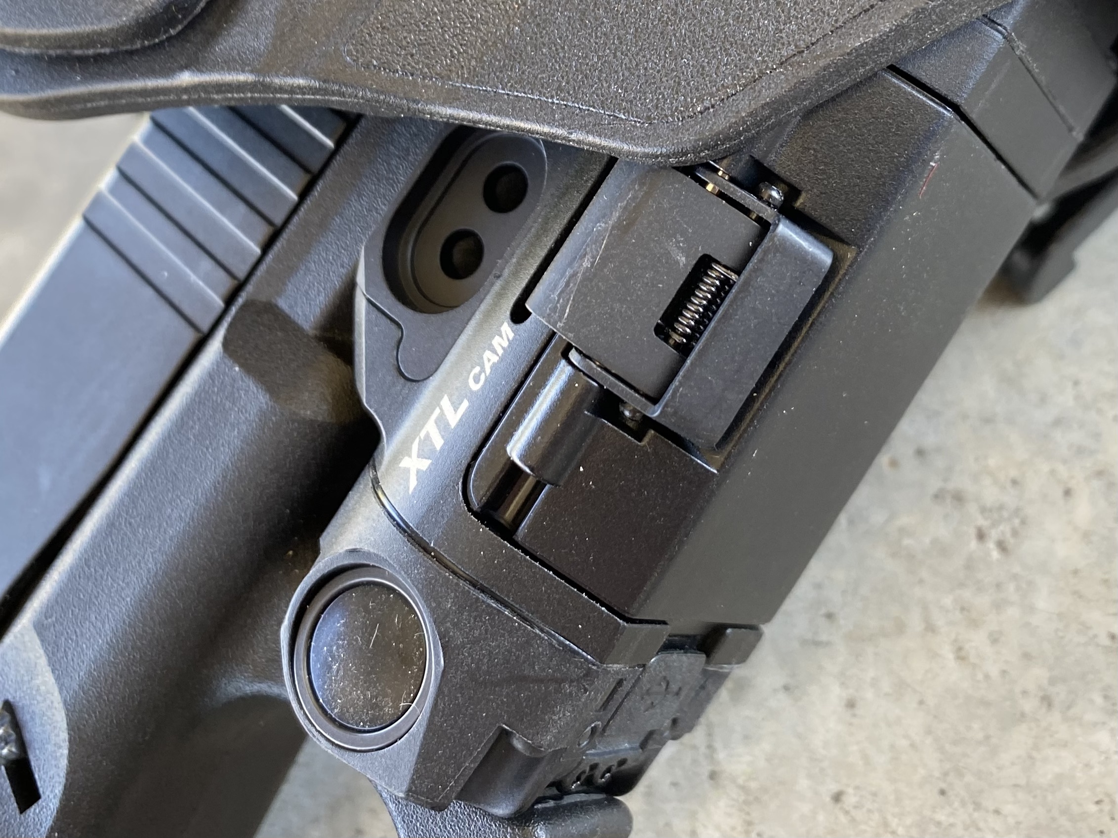 The unit attaches like most other lights. If there's a hang-up on a holster, it will be where the battery latch clips to the unit, but that's rare. 
