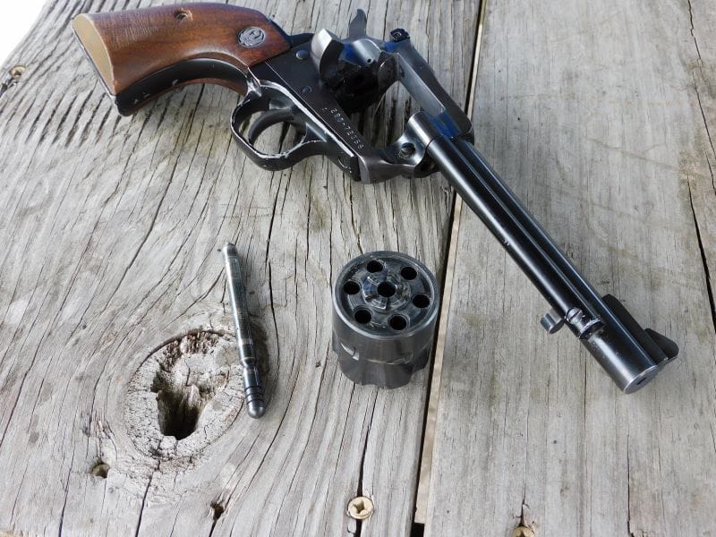 The Single Six revolver disassembled on a table.