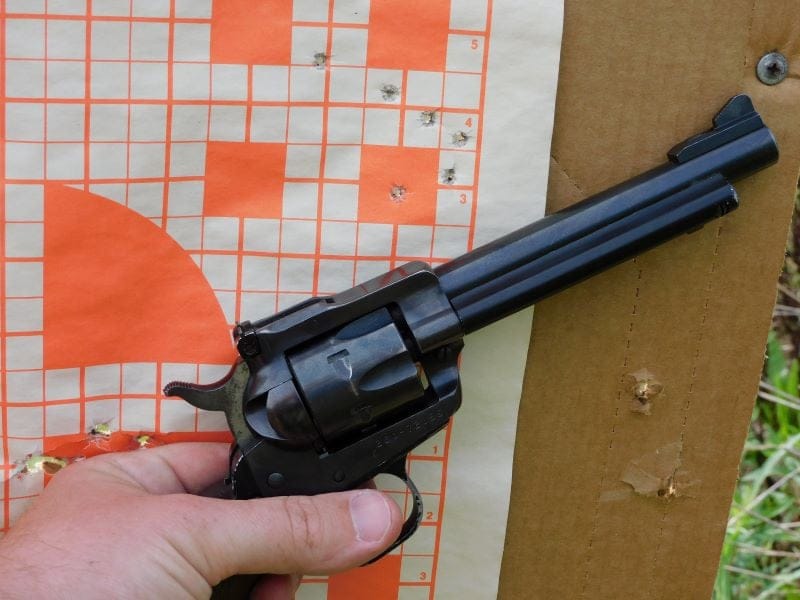A paper target punched by the Ruger.
