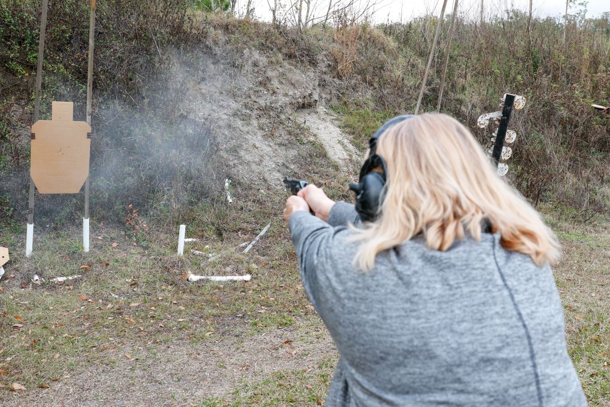 Female shooting the Colt Pocket Positive