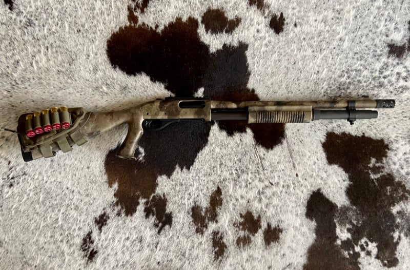 Remington 870 shotgun with magazine tube extension