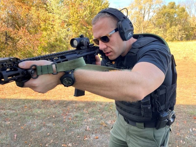 Wearing a ballistic vest.
