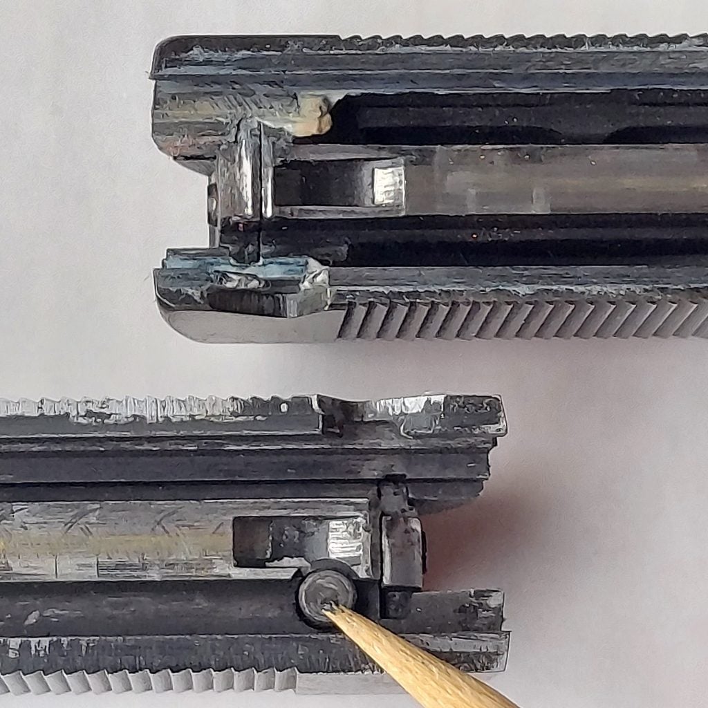 Series 80 pistols are distinguished by this plunger in the slide.