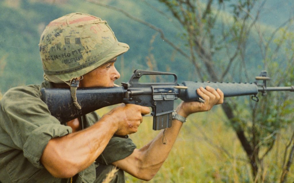 Soldier firing m16