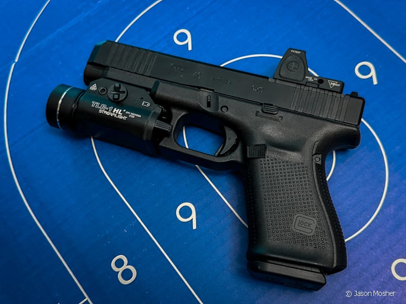 Glock 49 with RMR red dot and TLR-1 HL light.