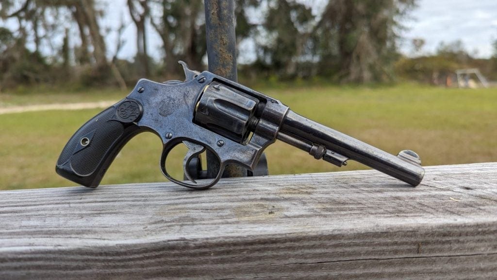 S&W Handejector model 1903 on wood