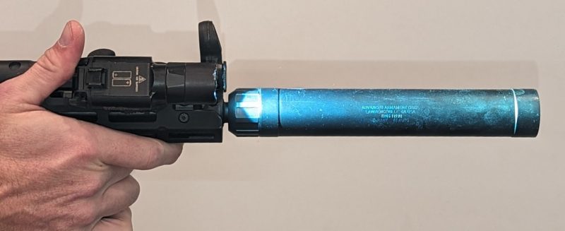 Rail with light and suppressor
