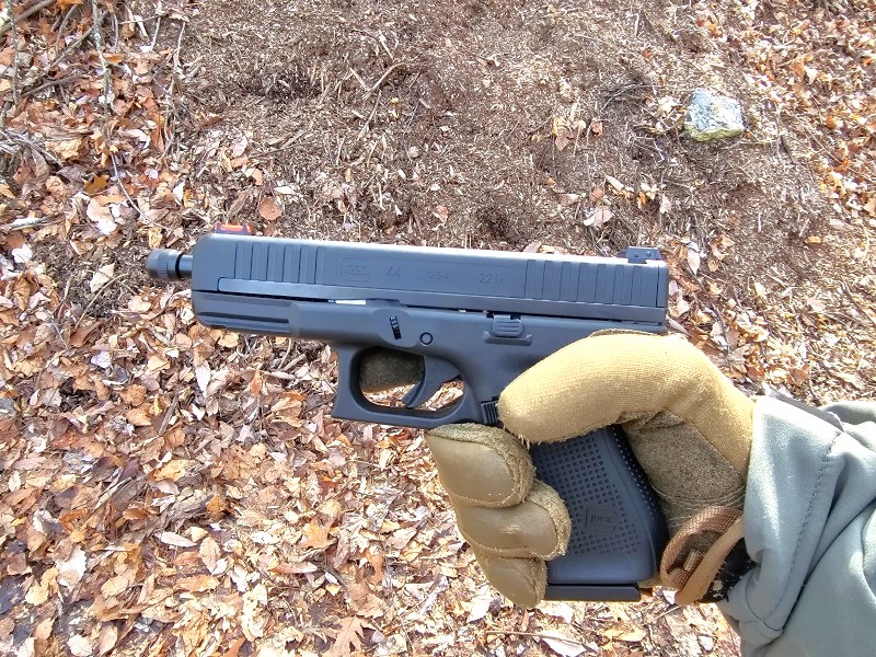 The Glock 44 in hand.