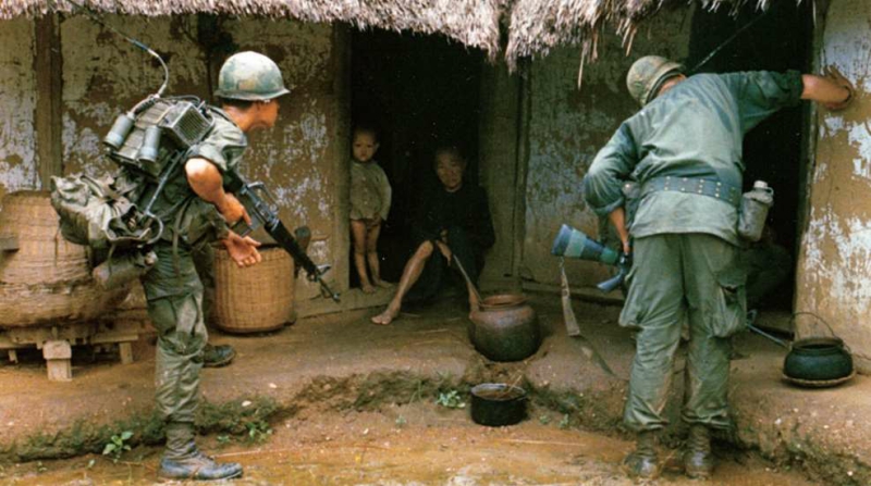 Soldier with XM-16E1 rifle in Vietnam