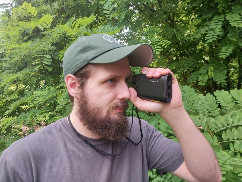 Man using Vortex Crossfire HD 1400 Laser Rangefinder